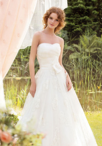 Style #1416, strapless lace ball gown with bow detail, available in white and ivory