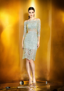 Style #930, knee-length lace cocktail dress with 3/4 off the shoulder sleeves, available in green