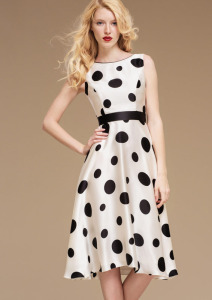 Style #0800A, boat neckline A-line silk dress decorated with black and white polka dots, comes in short or long