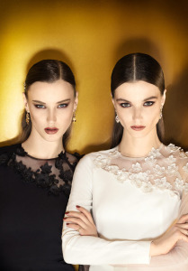 Style #902, long sleeve fitted cocktail dress with overlay mesh on one shoulder to arm decorated with flower embroidery, available in ivory, black, white, powder and blue