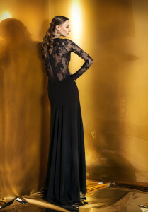 Style #918b, maxi fitted evening gown with an illusion lace low back and long sleeves, available in black and ivory