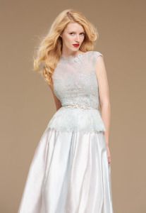 Style #0811, floor-length A-line dress with a lace embroidery peplum bodice and a jewel embellishment in the middle, available in white