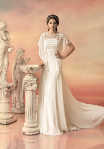 Style #1509, chiffon sheath wedding dress with draped sleeves, available in ivory