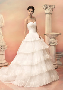 Style #1510L, strapless ball gown with tiered skirt, available in white and ivory