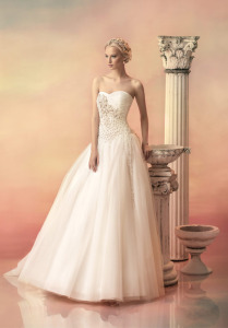 Style #1519, tulle ball gown wedding dress with beaded sweetheart bodice, available in ivory