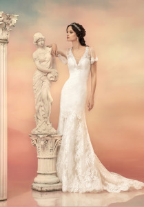 Style #1530L, plunging neckline fit and flare lace wedding dress with sleeves, available in white and ivory