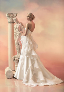Style #1531, a-line mikado wedding dress with organza peplum, available in white and ivory