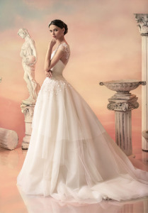 Style #1533L, tulle ball gown with tiered skirt and floral appliques, available in white, ivory and pink