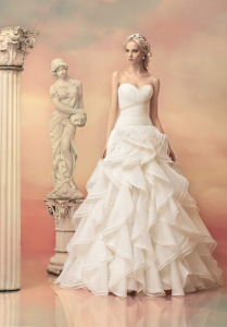 Style #1534L, ball gown wedding dress with ruffled organza skirt, available in white and ivory