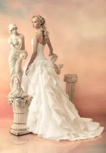 Style #1534L, ball gown wedding dress with ruffled organza skirt, available in white and ivory