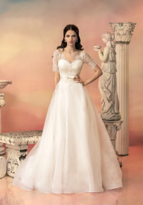 Style #1535, a-line wedding dress with lace bodice and sleeves, available in white and ivory