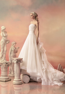 Style #1540L, a-line wedding gown with ruffled organza train, available in white and ivory
