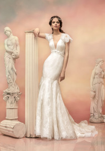 Style #1545L, plunging neckling lace fit and flare wedding dress with beaded waist, available in white and ivory