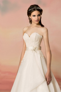 Style #1551L, sweetheart neckline lace and organza wedding dress, available in light ivory