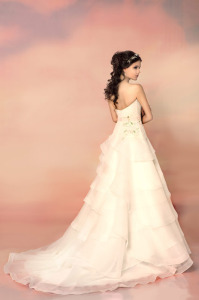 Style #1551L, sweetheart neckline lace and organza wedding dress, available in light ivory
