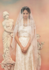 Style #1555, fit and flare lace wedding dress with short sleeves, available in ivory