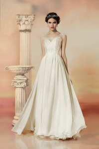 Style #1560, a-line wedding gown with lace bodice and illusion back, available in light ivory