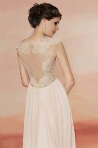 Style #1560, a-line wedding gown with lace bodice and illusion back, available in light ivory