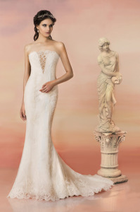 Style #1563L, lace mermaid wedding dress with plunging neckline and sheer back, available in white and ivory