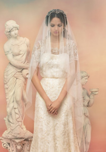 Style #1555, fit and flare lace wedding dress with short sleeves, available in ivory