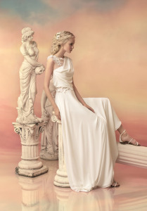 Style #1532, draped sheath wedding dress with illusion panels and floral appliques, available in white and ivory