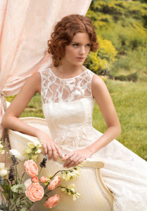 Style #1400, lace wedding gown with beaded floral embroidery, available in ivory