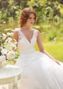 Style #1408, lace ball gown wedding dress with peplum, available in ivory
