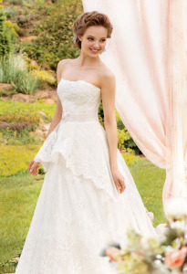 Style #1424, lace a-line wedding dress with peplum, available in white and ivory