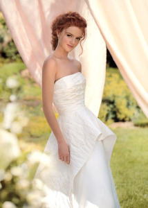 Style #1425, jacquard a-line wedding gown with peplum skirt, available in ivory
