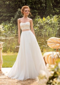 Style #1434, blush a-line wedding gown with lace bodice and silk flowers, available in pink-ivory