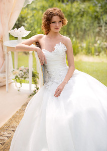 Style #1445, organza ball gown wedding dress with floral appliques, available in ivory