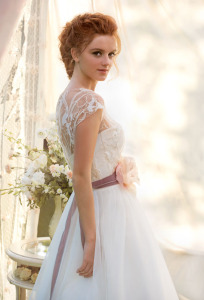 Style #1450, a-line tulle wedding gown with lace bodice and floral belt, available in ivory