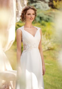 Style #1453, chiffon sheath wedding gown with sheer sides, available in white and ivory