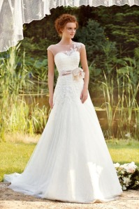 Style #1455, lace a-line wedding dress with illusion neckline, available in ivory
