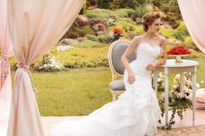 Style #1456, lace mermaid wedding gown with ruffled skirt, available in white and ivory