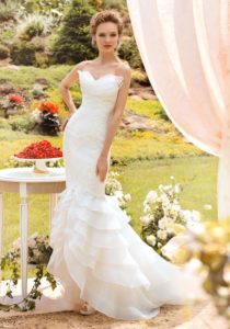 Style #1456, lace mermaid wedding gown with ruffled skirt, available in white and ivory
