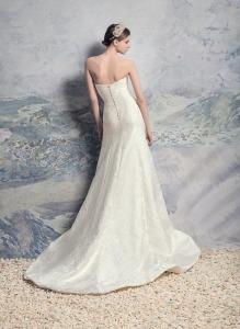 Style #1600L Premium, fit and flare jacquard wedding gown with beaded belt, available in light ivory