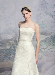 Style #1600L Premium, fit and flare jacquard wedding gown with beaded belt, available in light ivory