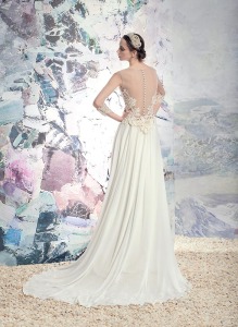 Style #1602L, illusion back sheath wedding dress with sheer sleeves and lace details, available in ivory