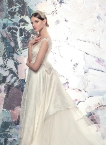 Style #1610, plunging neckline jacquard a-line wedding dress with beaded belt and train, available in cream