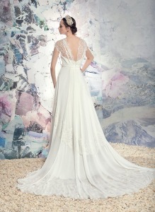 Style #1613L, vintage-inspired sheath wedding dress with lace details, available in white and ivory