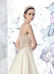 Style #1614L, tulle A-line wedding dress with beaded bodice and illusion neckline, available in ivory