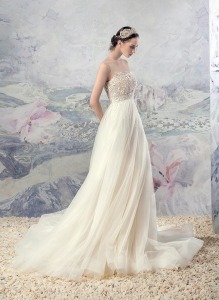 Style #1614L, tulle A-line wedding dress with beaded bodice and illusion neckline, available in ivory
