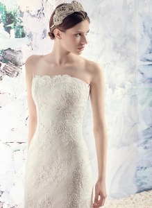 Style #1616L, fit and flare strapless lace wedding gown, available in white and ivory