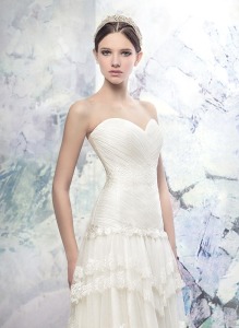 Style #1617L, sweetheart neckline A-line wedding dress with layered lace skirt, available in light ivory