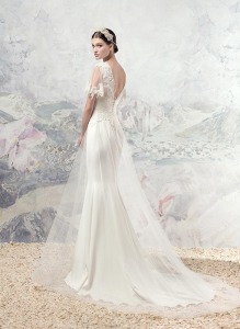 Style #1623L, sheath wedding dress with tulle overskirt and beaded lace sleeves, available in cream