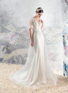 Style #1623L, sheath wedding dress with tulle overskirt and beaded lace sleeves, available in cream