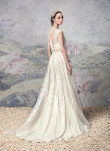 Style #1624L, cap sleeve lace A-line wedding dress with a thin sash, available in ivory