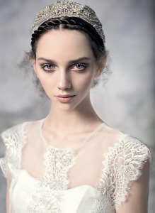 Style #1624L, cap sleeve lace A-line wedding dress with a thin sash, available in ivory
