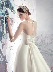 Style #1626, Mikado pleated wedding gown with illusion neckline, 3/4 length sleeves and detachable train, available in white and ivory